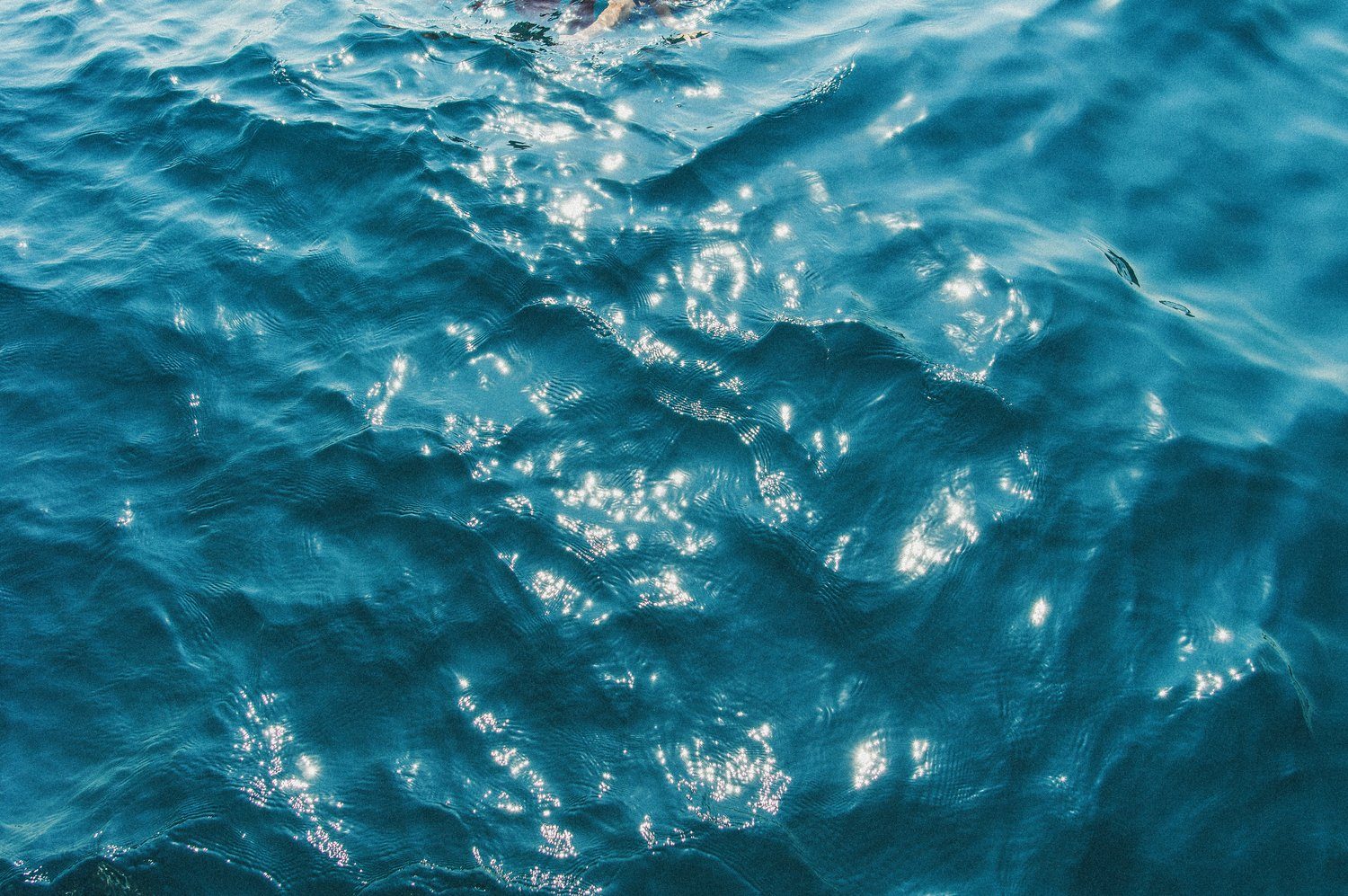 Turquoise water catching the light