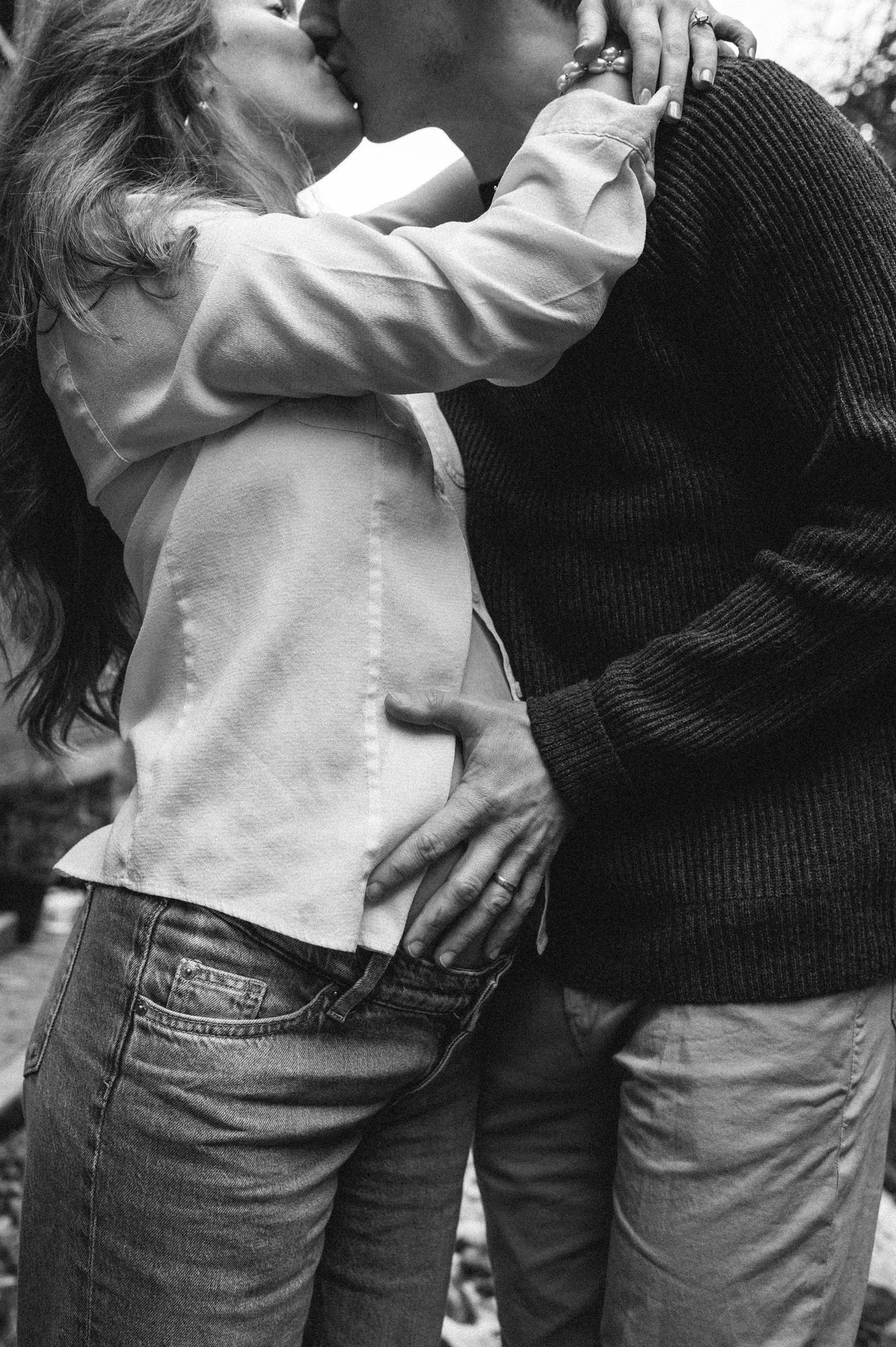 A couple embracing, in black and white
