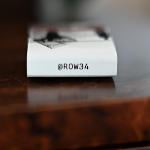 Row 34 matchbook, side