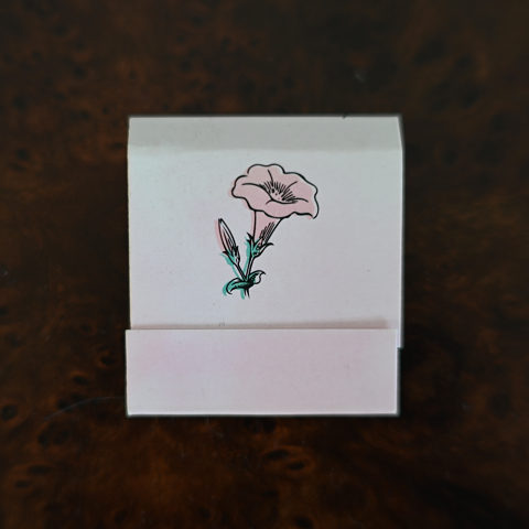 Delilah matchbook, front