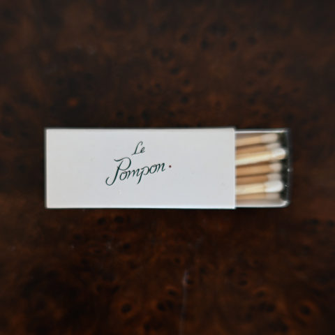 Le Pompon matchbox, front