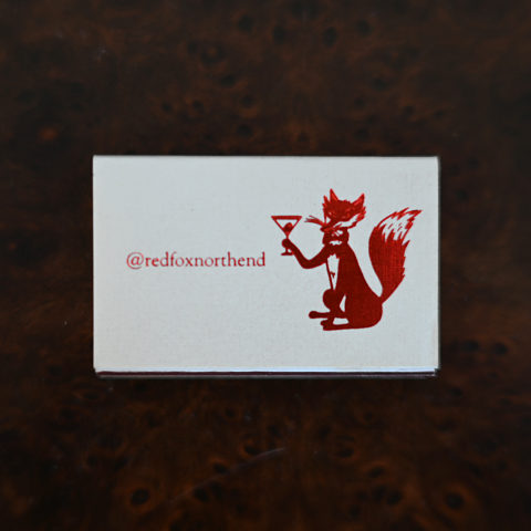 The Red Fox matchbox, back