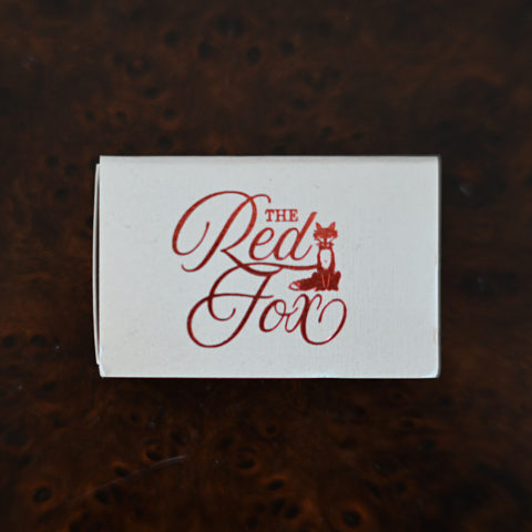 The Red Fox matchbox, front