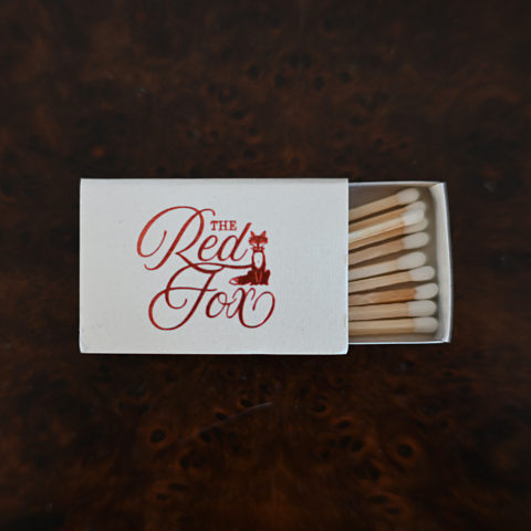 The Red Fox matchbox, open